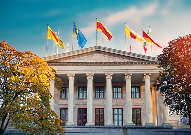 University-Building-with-flags_Front